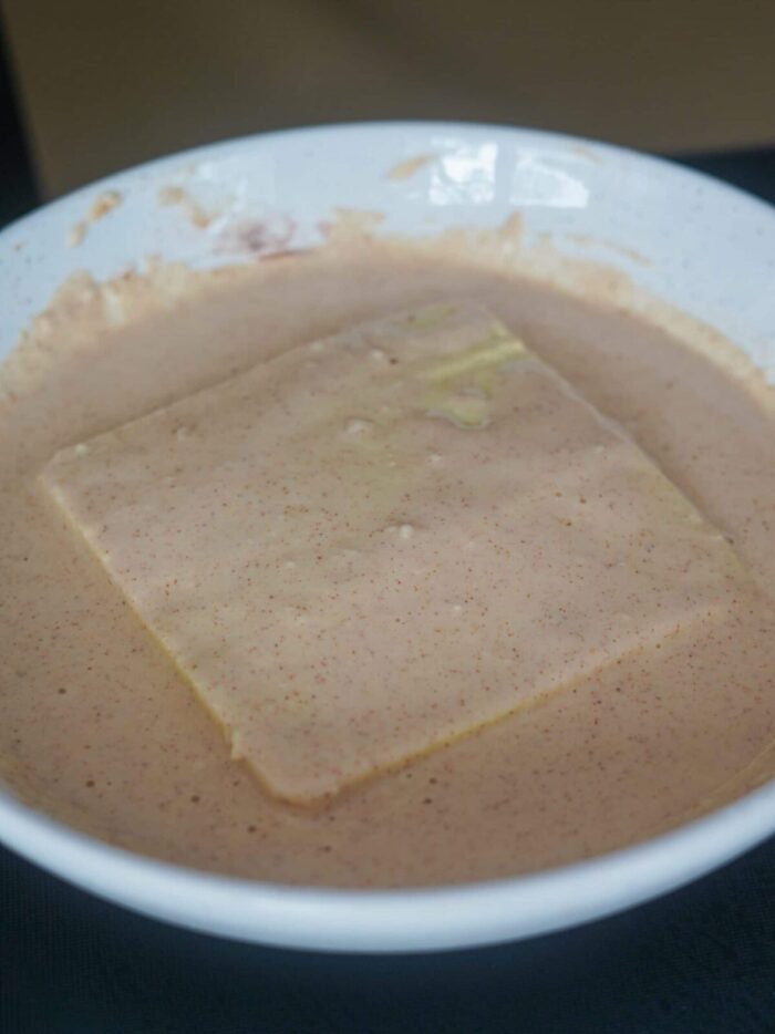 Marinated tofu coated in vegan frying batter.