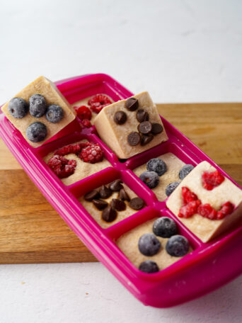 frozen pancake batter in pink ice cube tray
