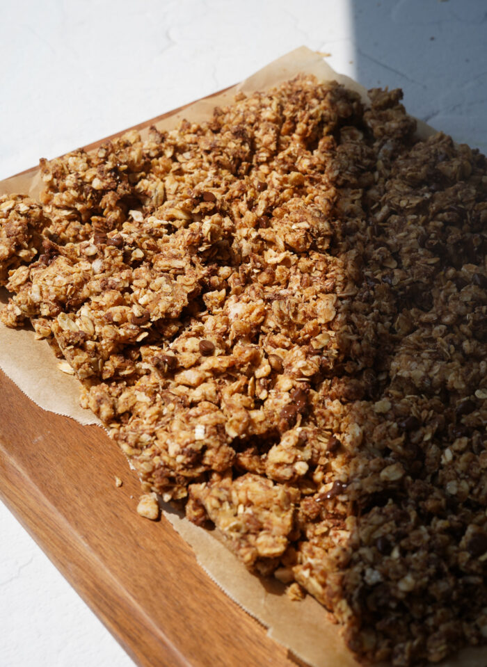 Easy Vegan Homemade Granola on a wooden cutting board