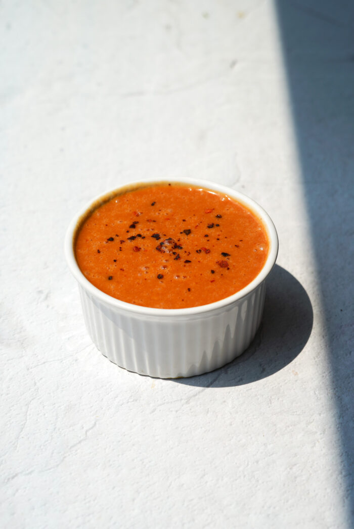 peanut sauce in a small white bowl