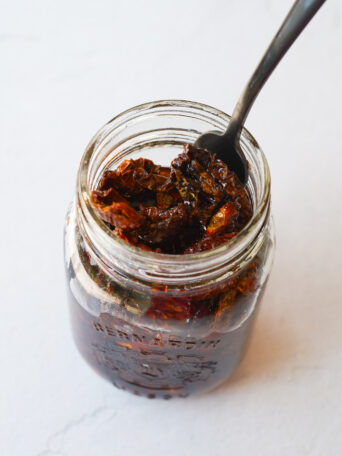 sun dried tomatoes open in a jar