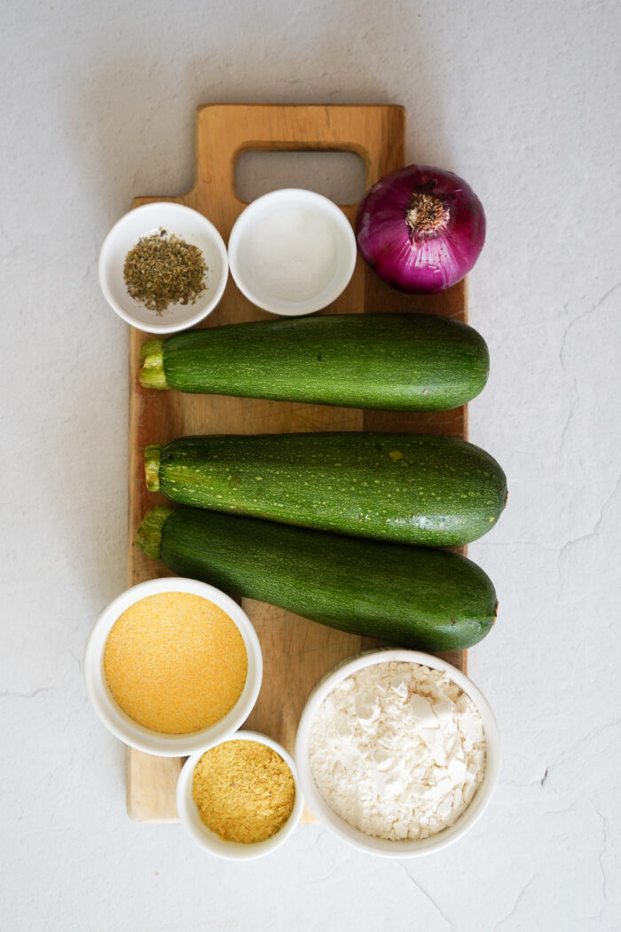 Scarpaccia Zucchini Tart ingredients on a cutting board