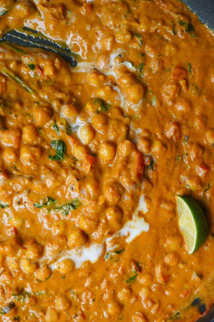 peanut butter curry close up with a lime wedge