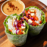 giant spring rolls served with peanut sauce