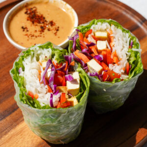 giant spring rolls served with peanut sauce