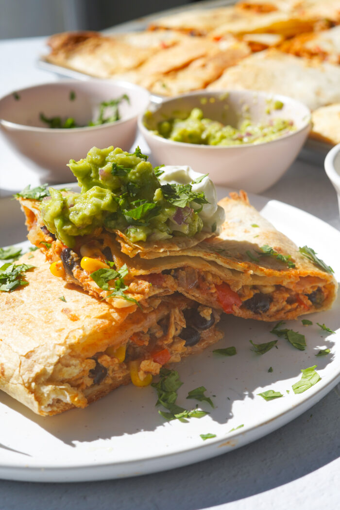 vegan quesadillas served on a white plate