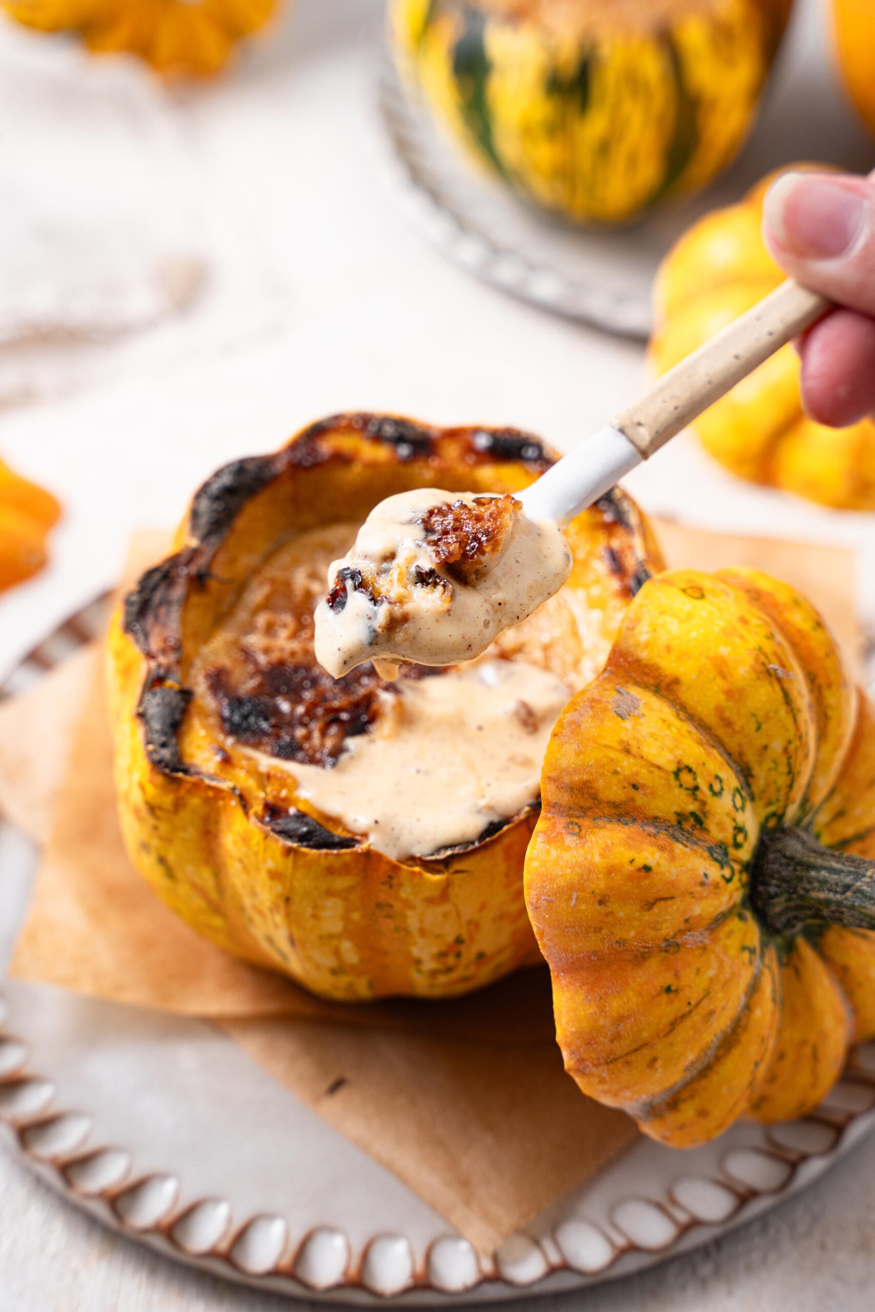 mini pumpkin brulee scooped with a spoon