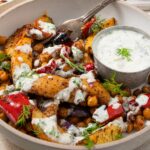 mediterranean bowls with vegan tzatziki drizzled on top