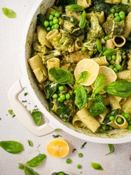 creamy one pot green pasta close up served with lemon and basil