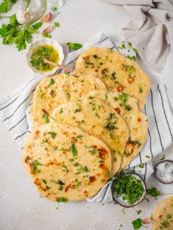 high protein flatbread served with coriander and garlic butter