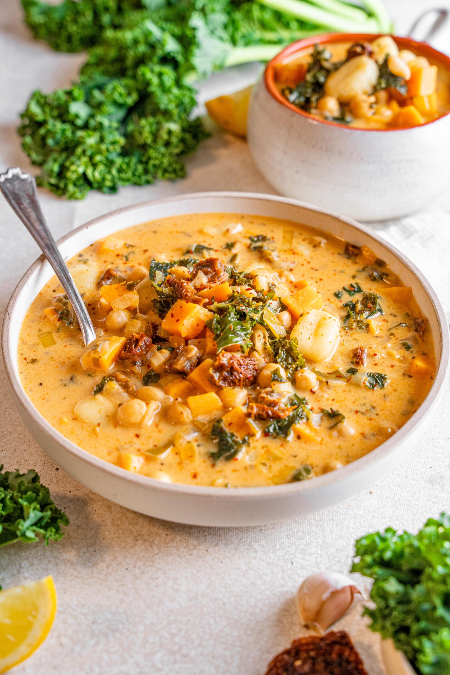 marry me tuscan vegetable soup served in a big bowl with a spoon