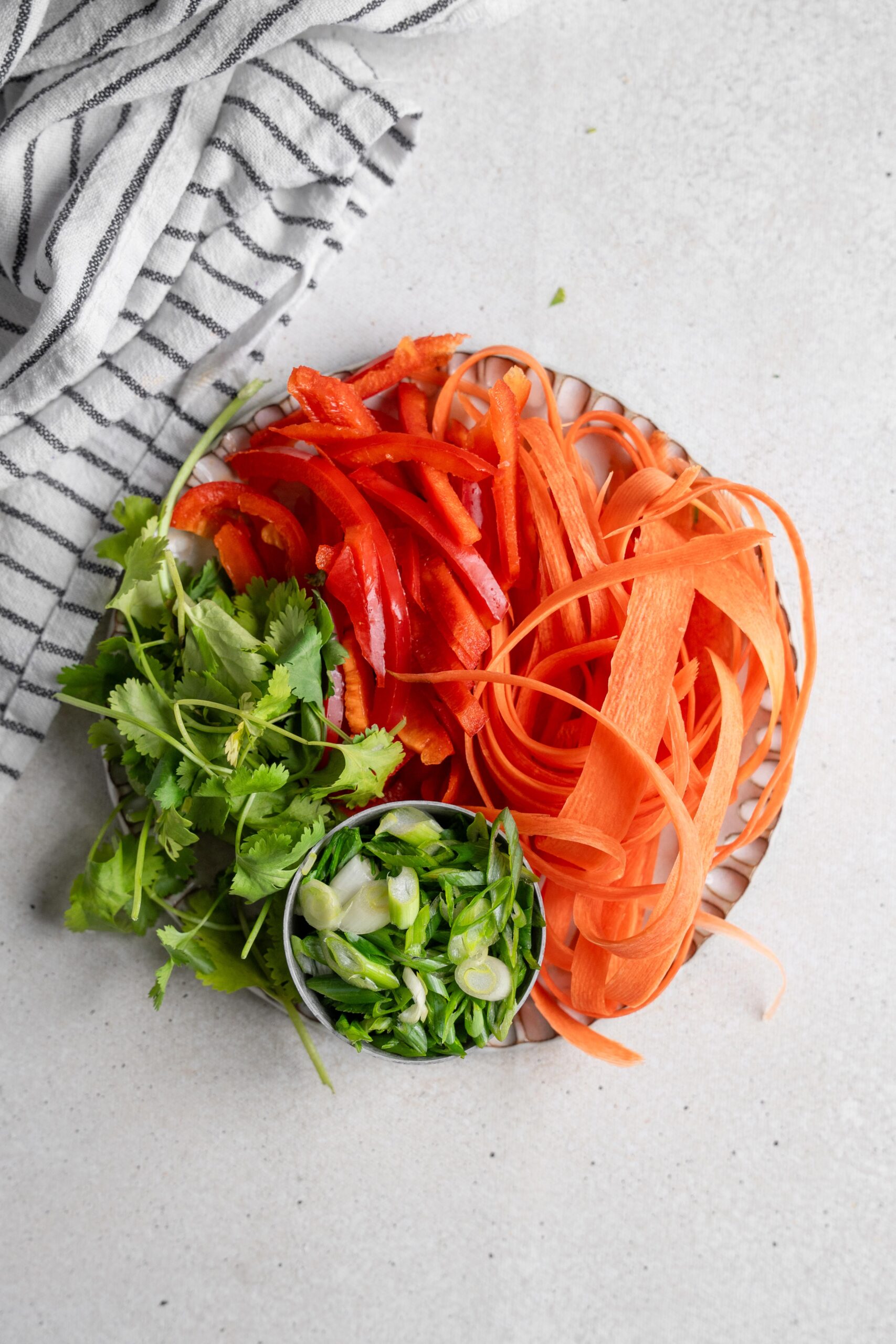 fresh vegetables chopped and laid on a plate