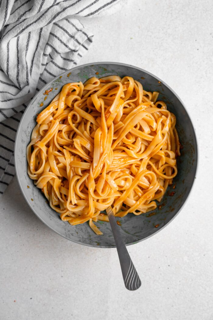 noodles mixed with gochujang sauce