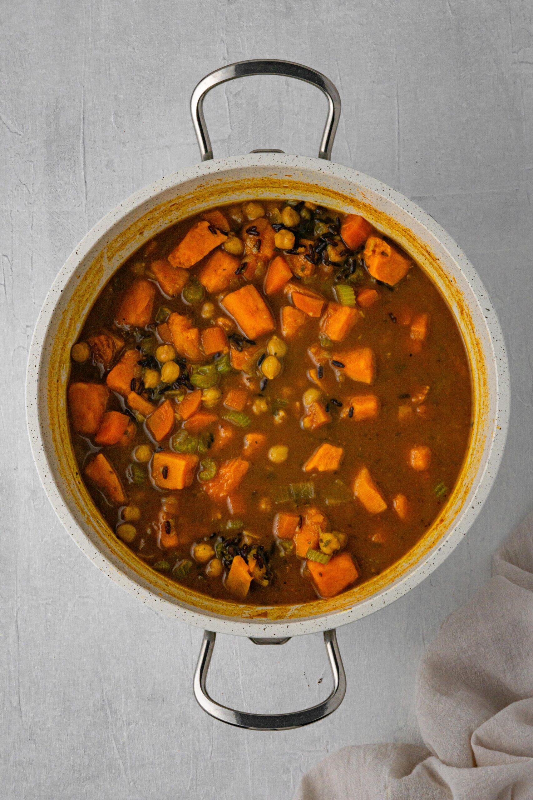 vegeables, wild rice and brith in a light soup pot