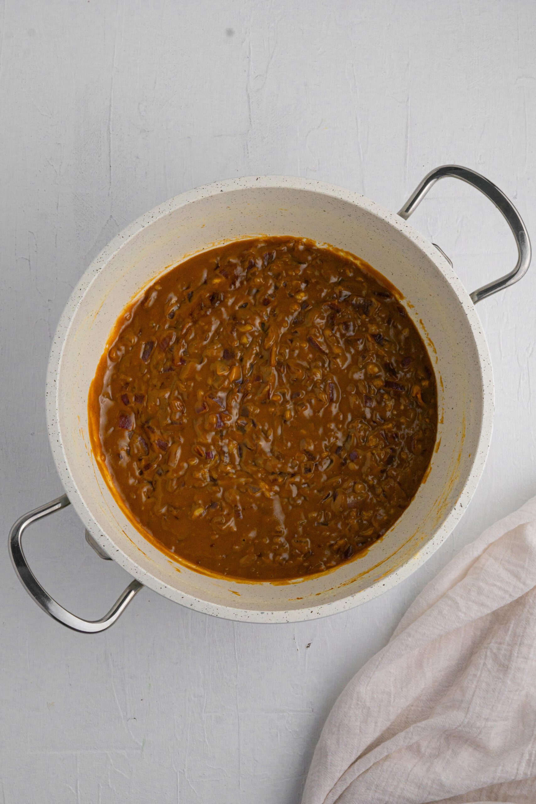 aromatics cooked in peanut butter sauce