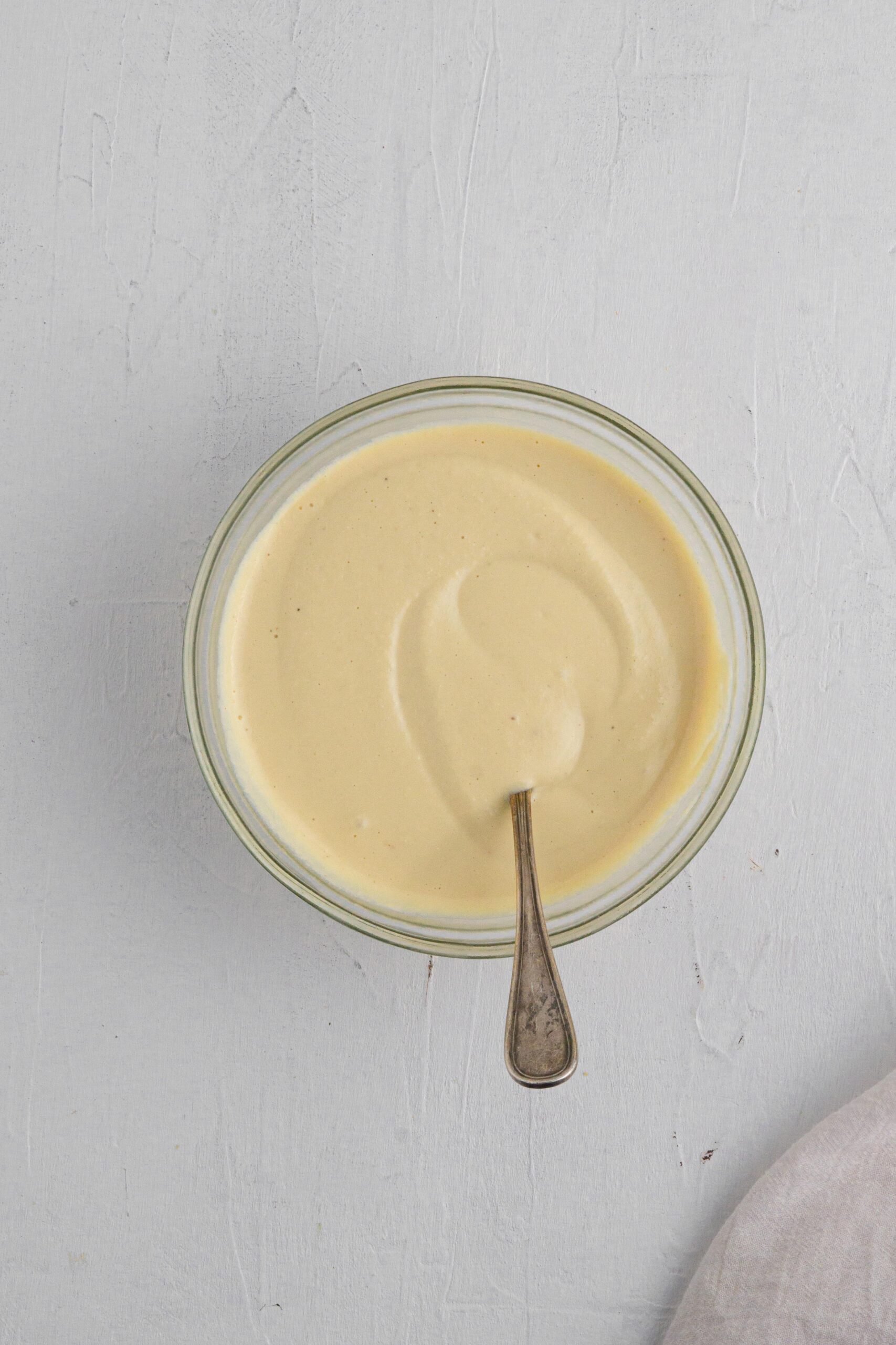 healthy vegan mayo after being set in the fridge