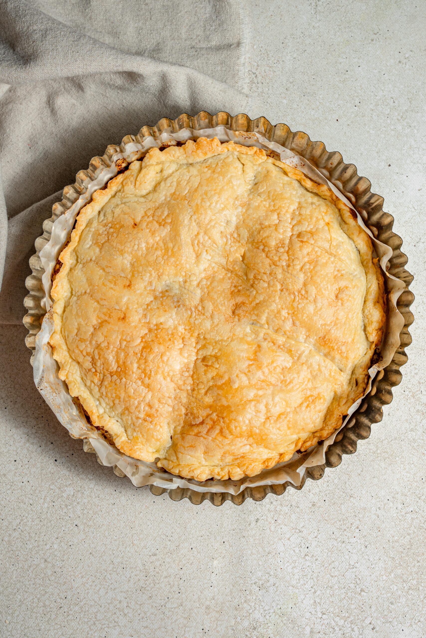 caramelized onion tart baked upside down until the pastry is crispy and browned