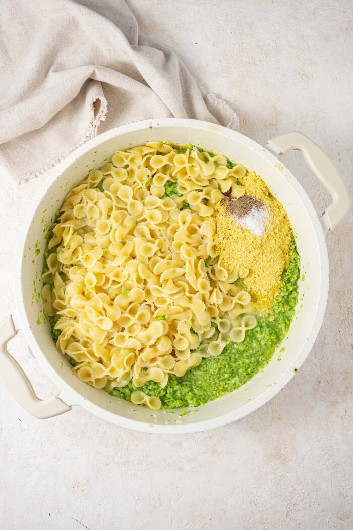 broccoli sauce and pasta mixed together in a pan