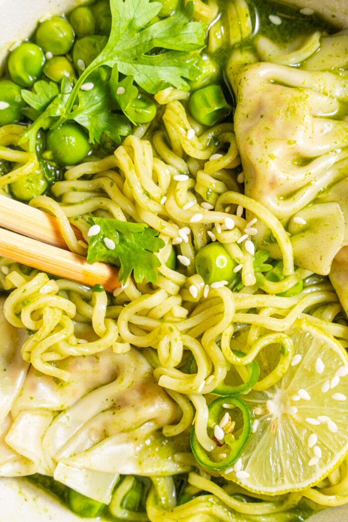 close up of green spring dumpling soup