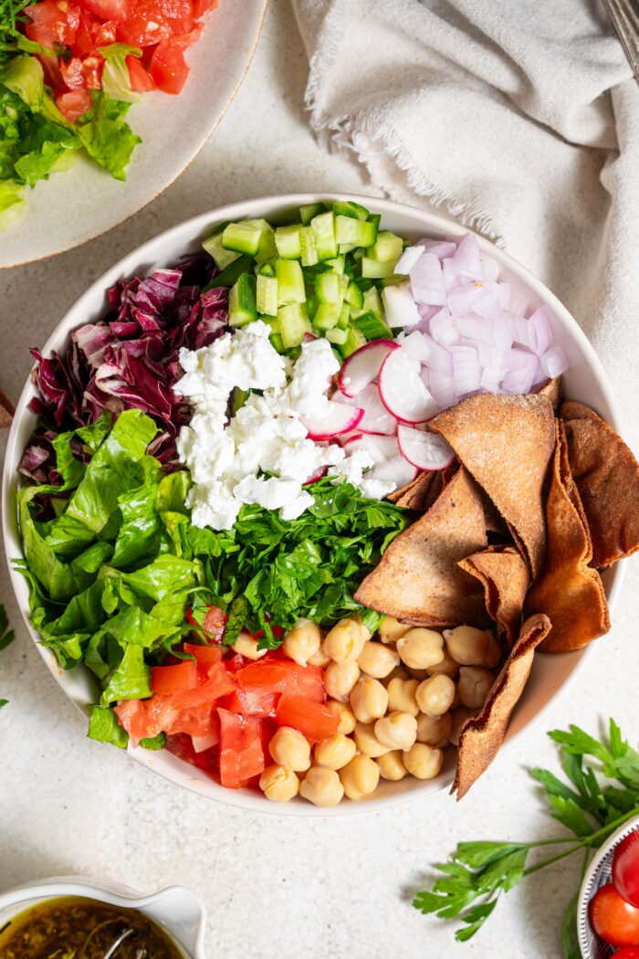top down shot of fattoush salad with chickpeas
