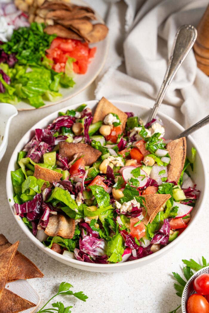 fattoush salad with chickpeas mixed together in a bowl