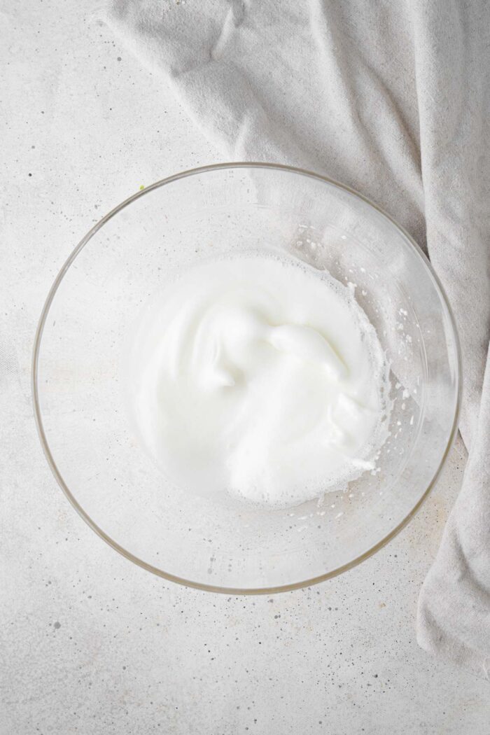 Foamy aquafaba beaten with cream of tartar.