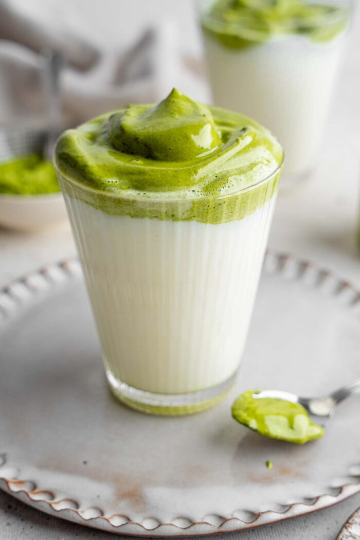 Close up of dalgona matcha drink.
