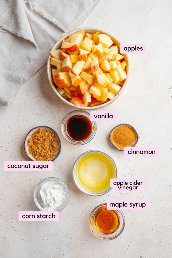 Healthy stewed apples ingredients laid out and labeled.