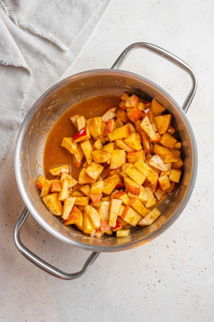 Stewed apples in the process of cooking.