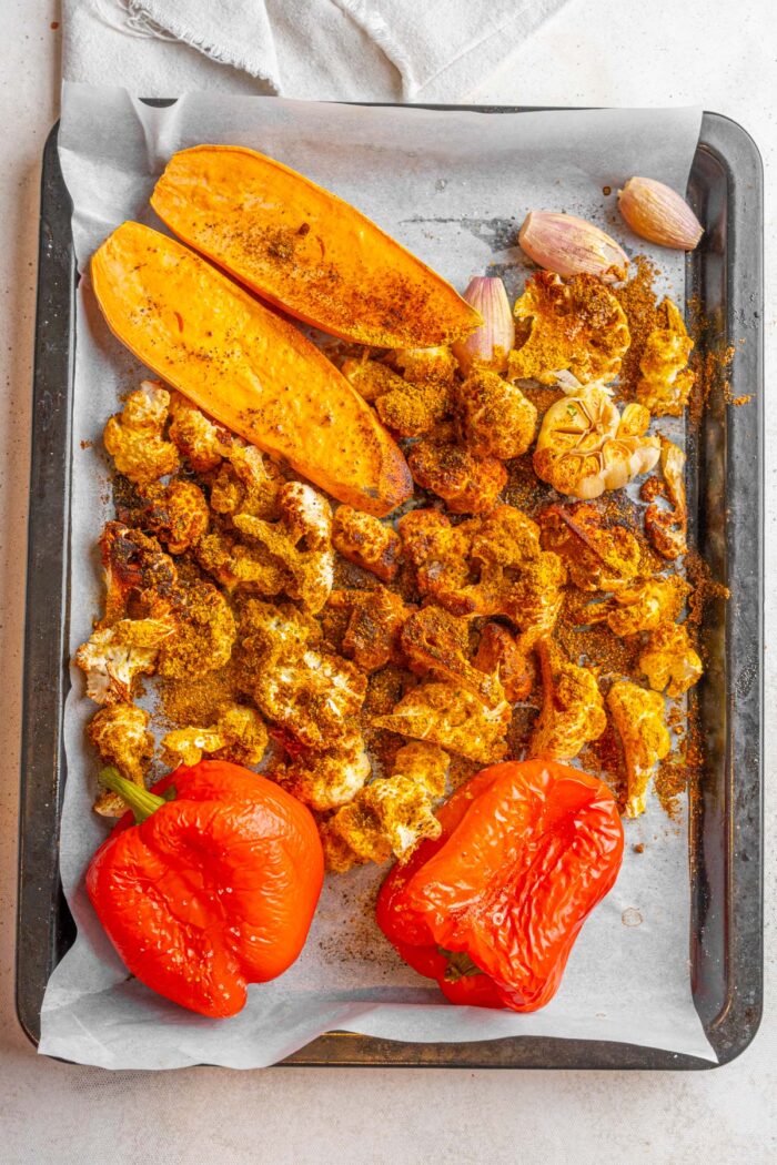 Roasted vegetables on the sheet pan, fresh out of the oven.