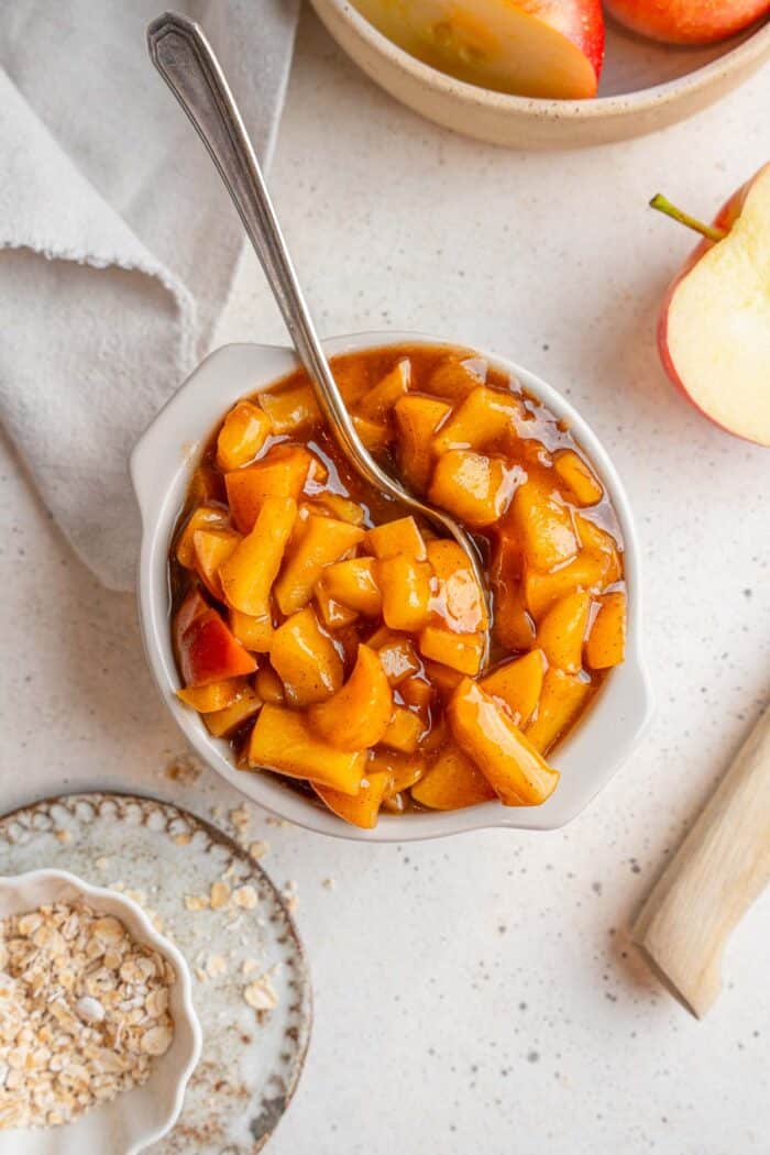 Title image for healthy stewed apples in a bowl.