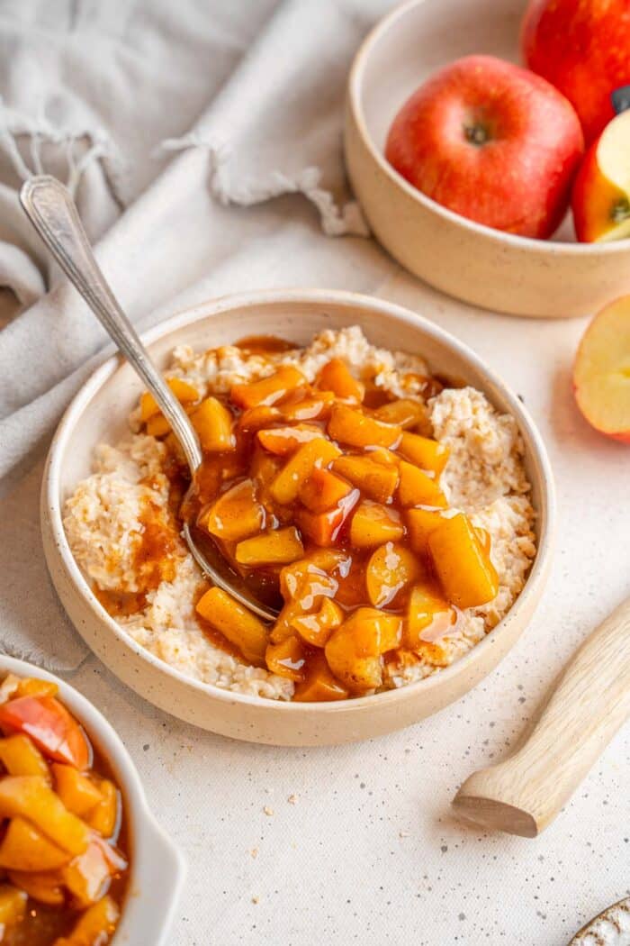 Stewed apples served over oatmeal.