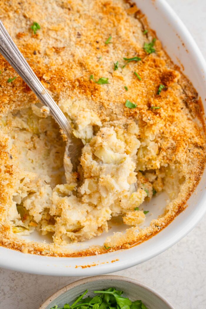 Close up shot of Rumbledethumps with a serving spoon sticking out.