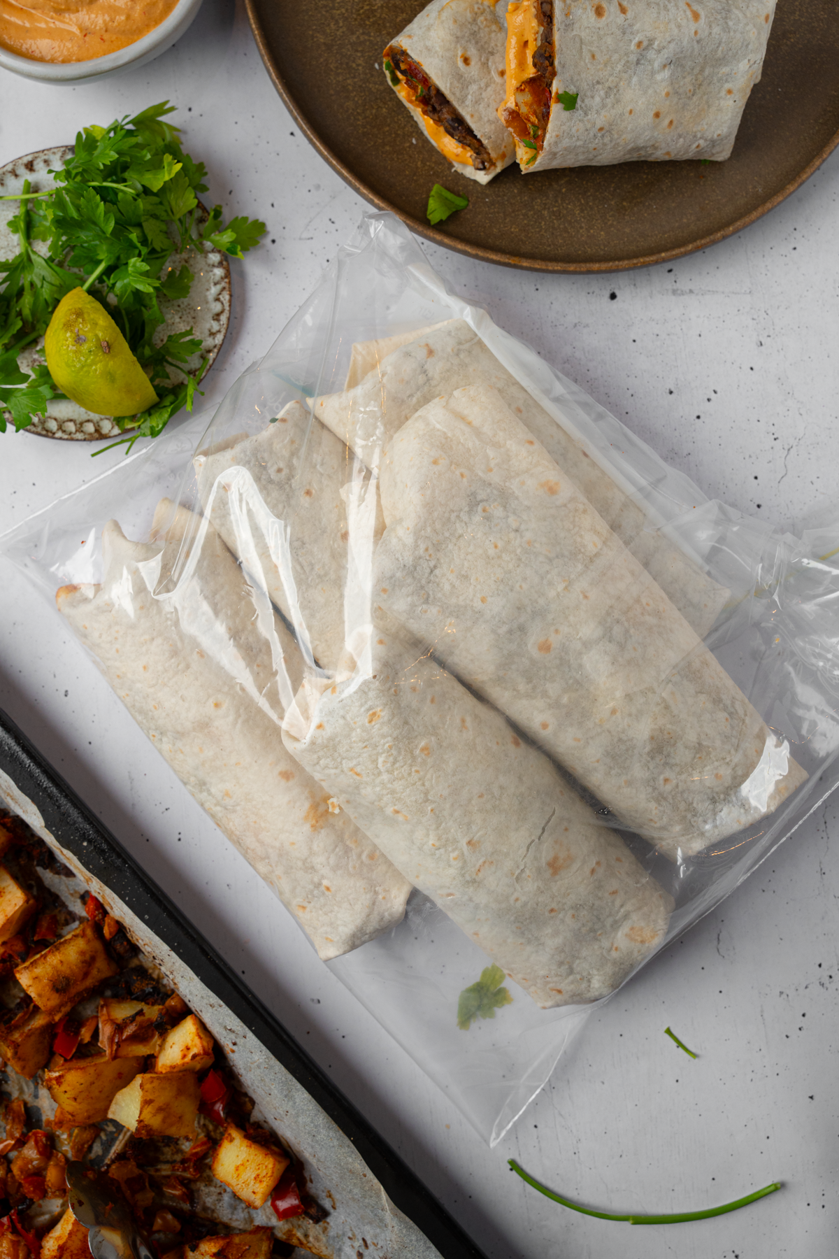 Burritos ready for the freezer.
