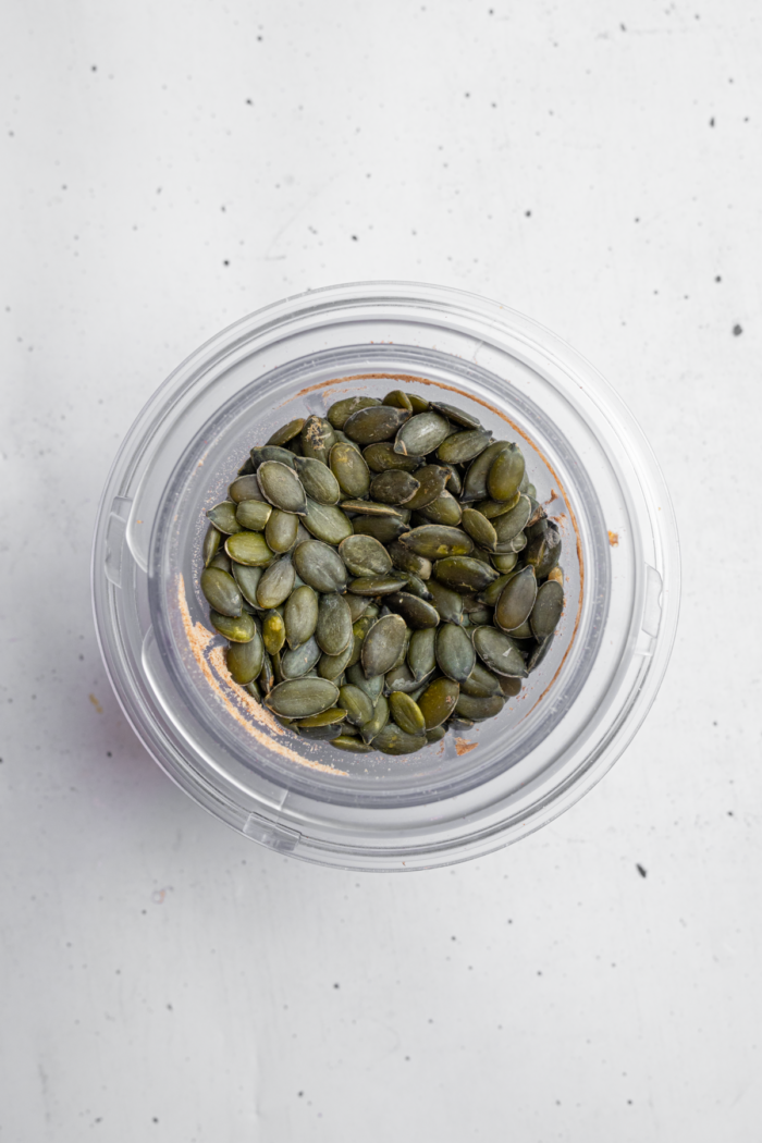 Pumpkin seeds in a spice grinder.