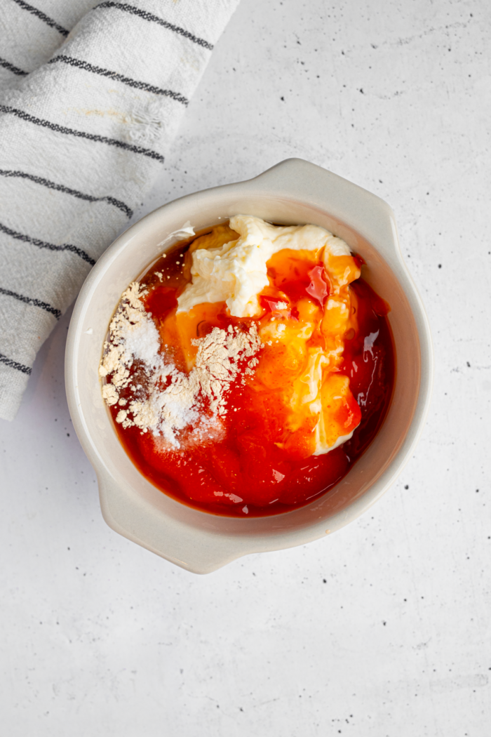 Bang bang sauce ingredients in a bowl.