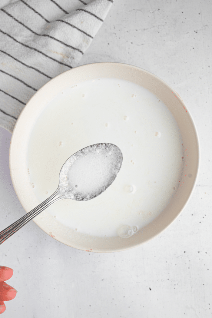 Vegan buttermilk made by combining plant-based milk and acid (vinegar)