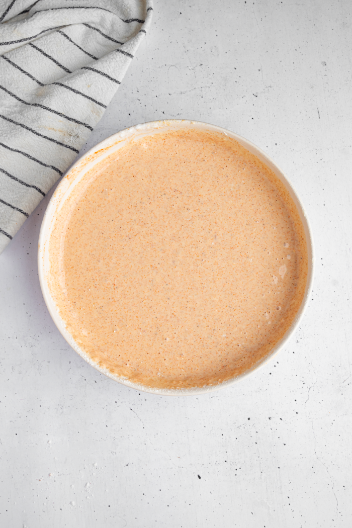 Mixed spiced vegan batter for bang bang cauliflower.