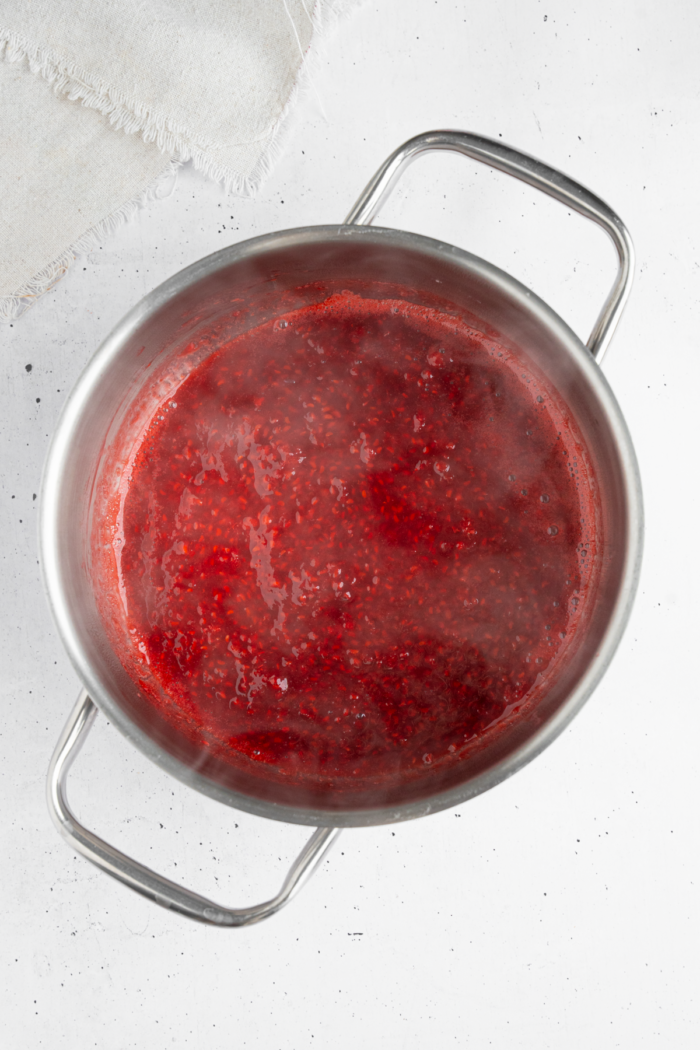Freshly cooked raspberry syrup for yogurt parfait.