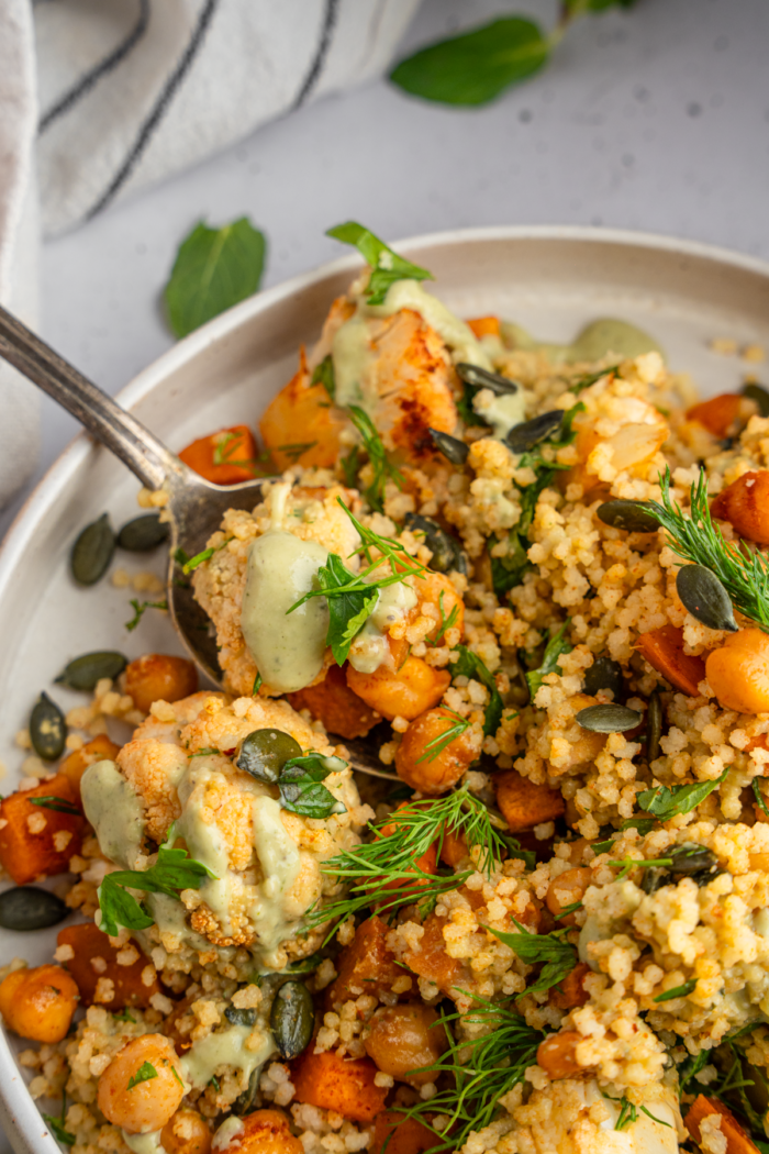 Close up shot of the cauliflower sweet potato couscous salad.