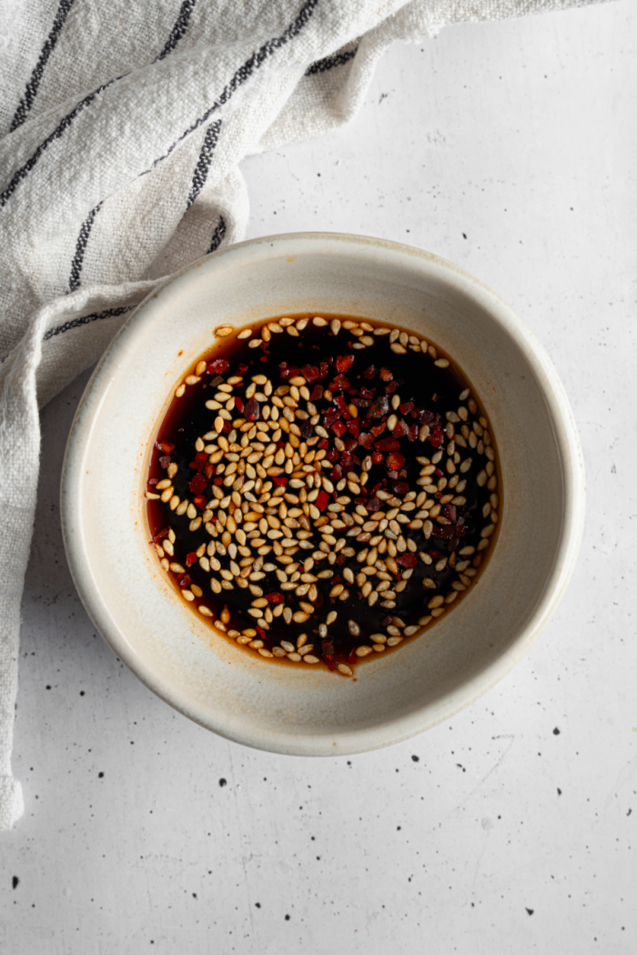 Dumpling dipping sauce in a small bowl.
