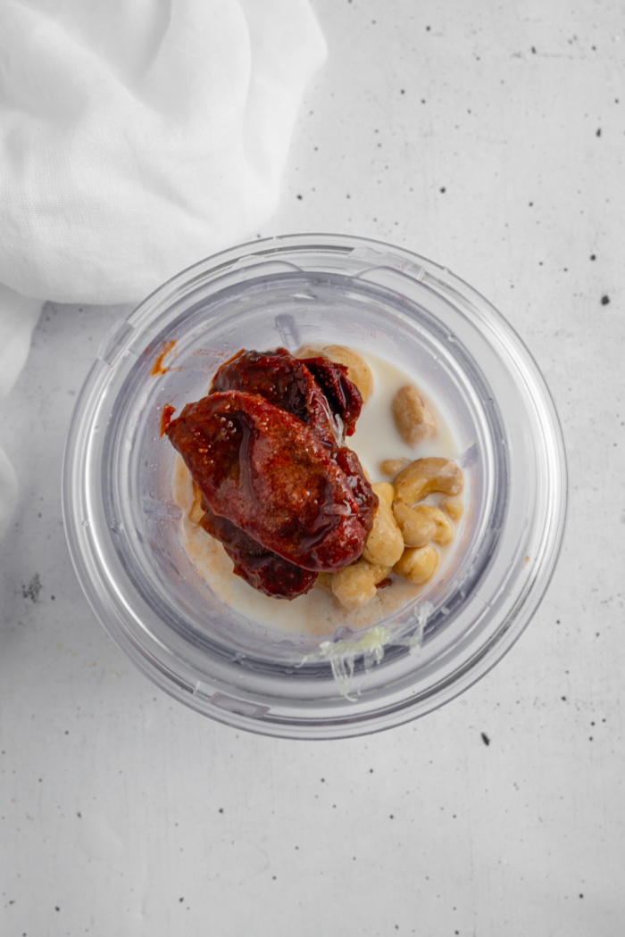 Creamy taco sauce ingredients in a high-speed blender.