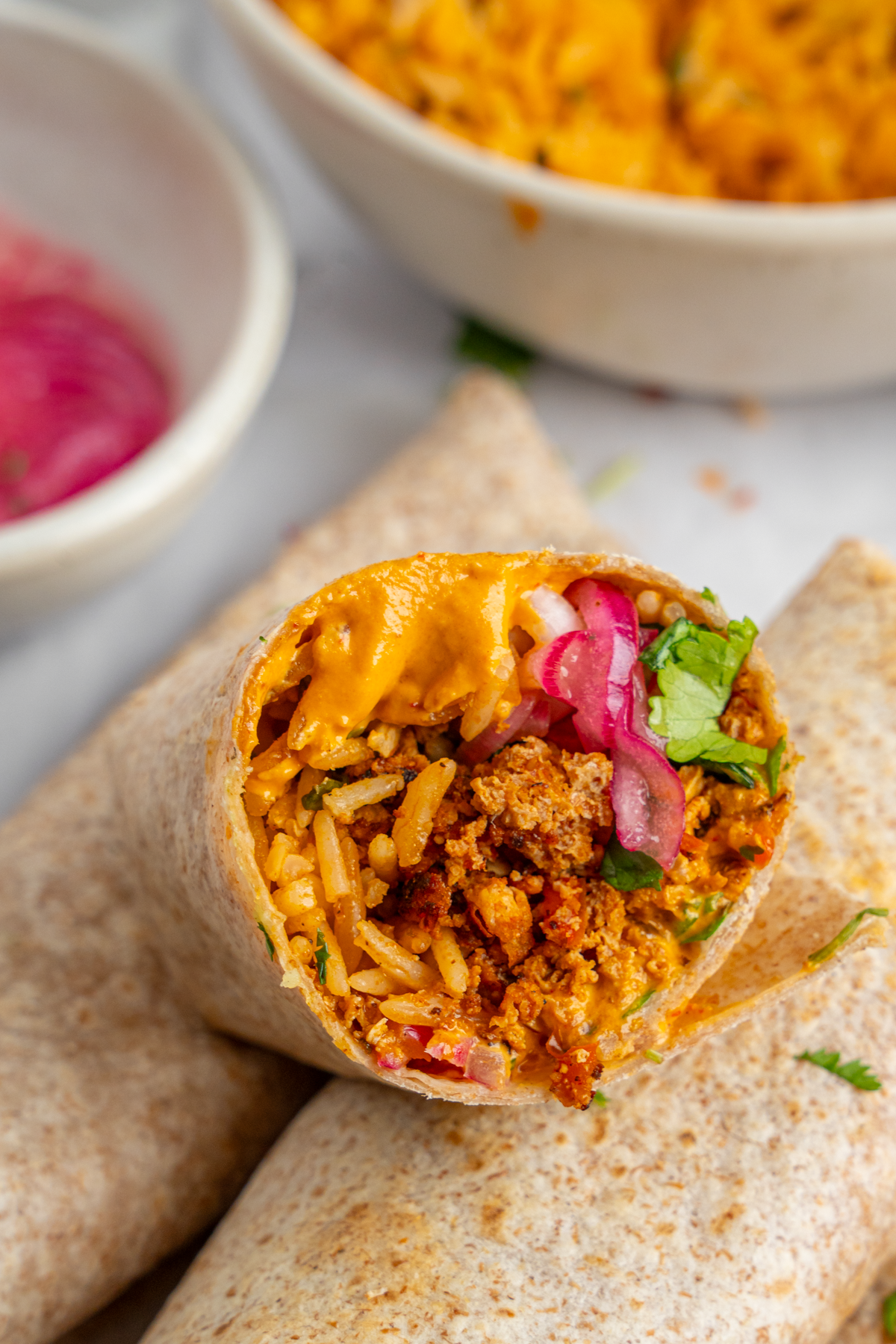 Cross section of a meal prep burrito close up.