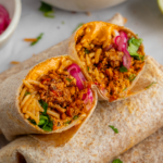 Meal prep burritos cut in half.