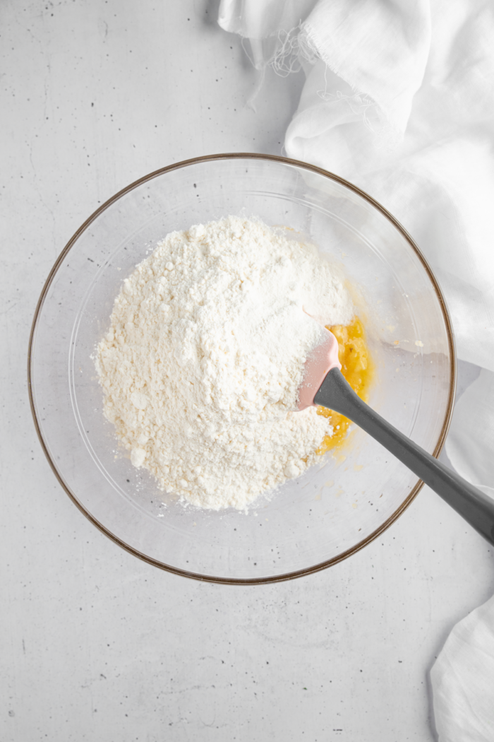 Dry ingredients added to the bowl of wet ingredients to make the dough.
