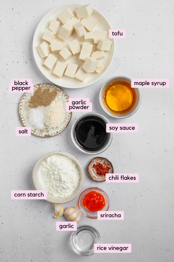 Vegan "honey" garlic tofu ingredients laid out and labeled on a white background.