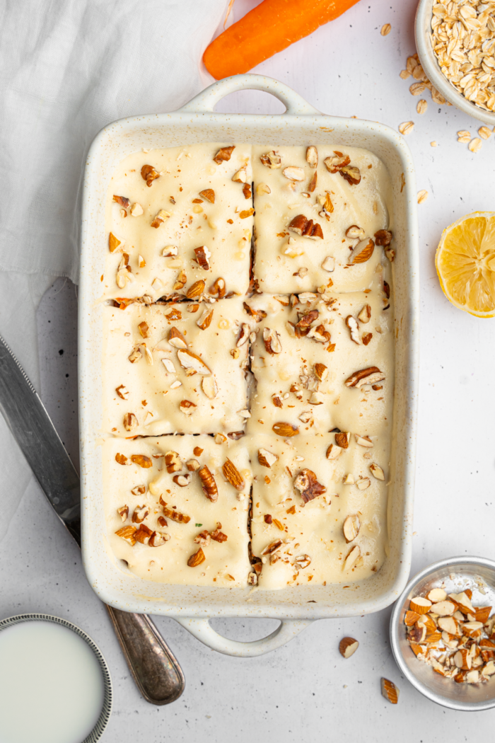 Carrot cake baked oatmeal in the baking dish, shot from the top down.