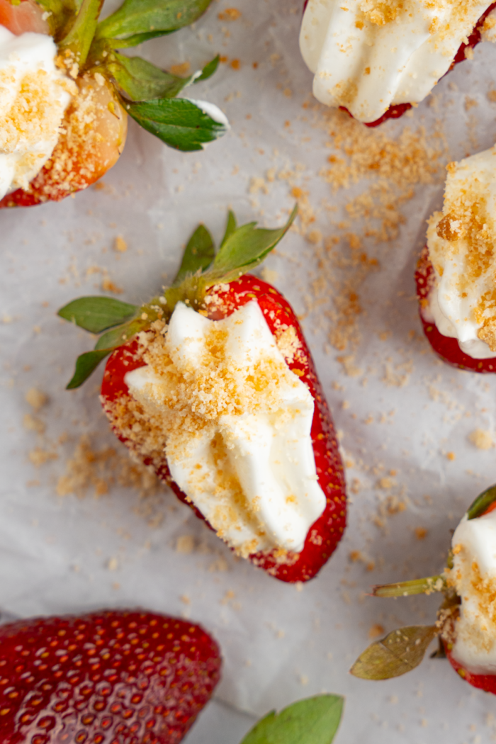 Close up of a deviled strawberry on a light background.