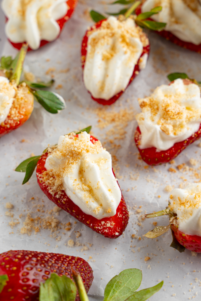 Deviled strawberries topped with graham cracker crumbs.