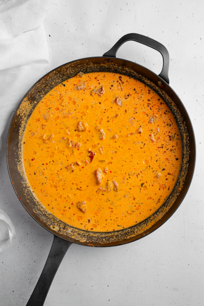 Vegetable broth and coconut milk added to the pan until you get a creamy sauce.